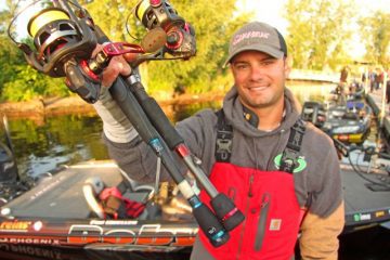 Matt Lee Holding Spinning Reels